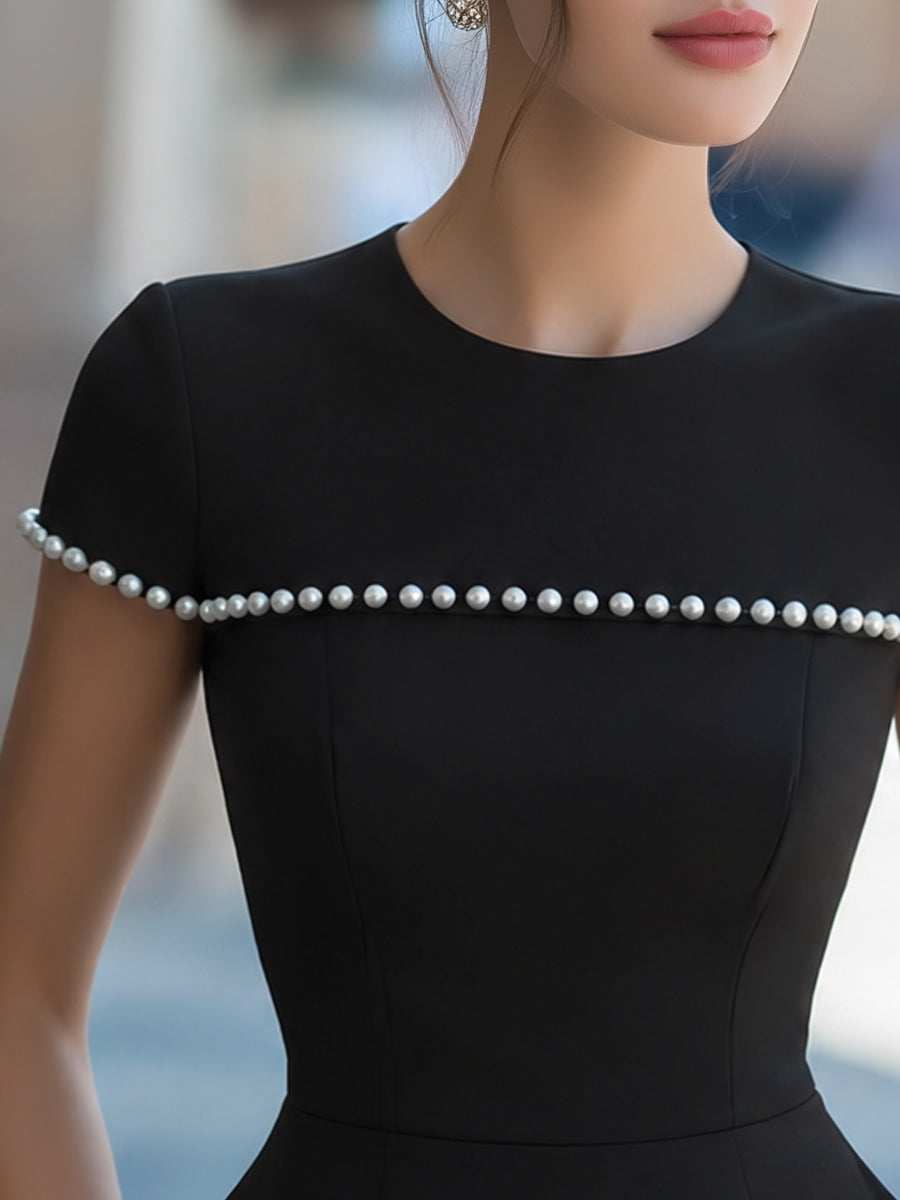 Léon Varel Pearl-Trim Short-Sleeve Structured Peplum Top