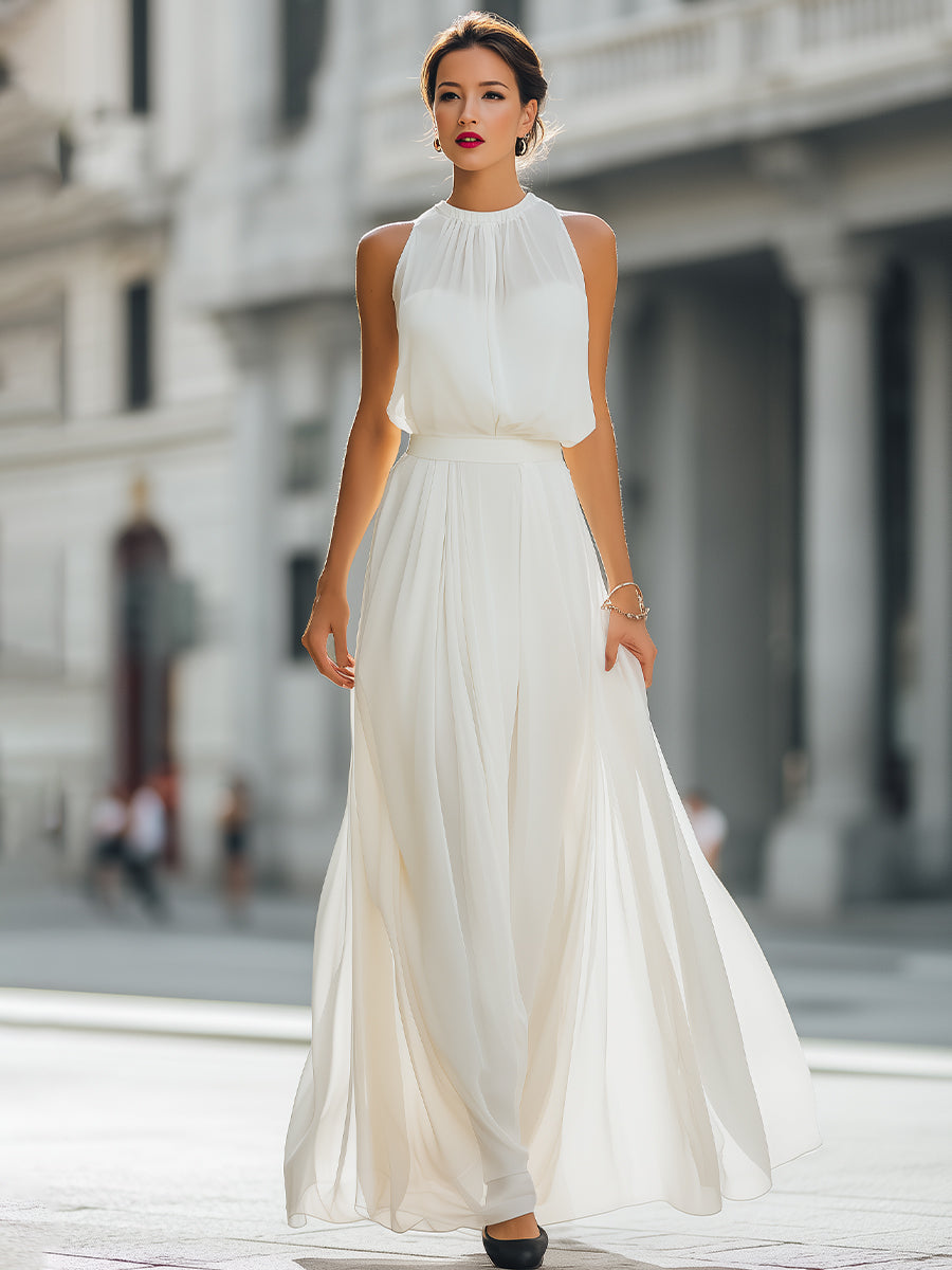 Léon Varel Pleated Halter Neck Maxi Dress with Flowing Skirt