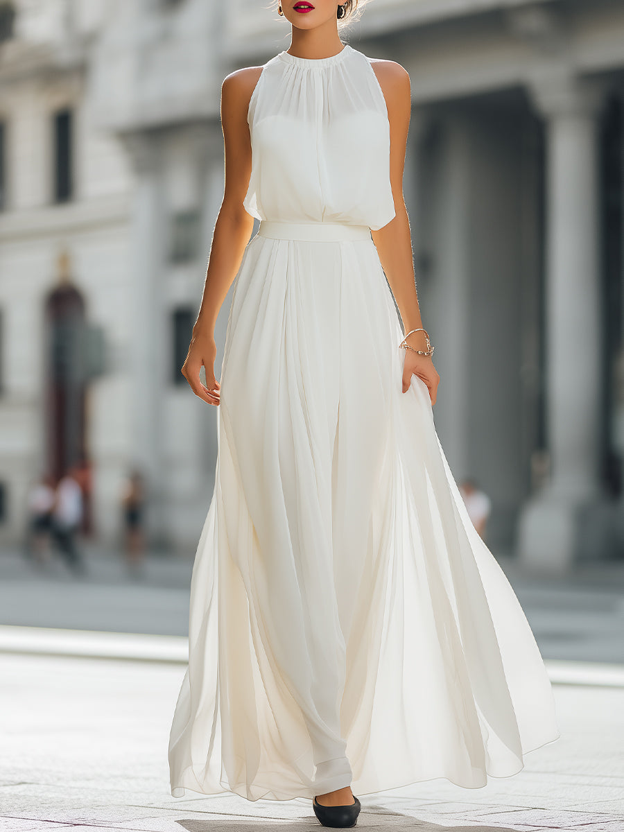 Léon Varel Pleated Halter Neck Maxi Dress with Flowing Skirt