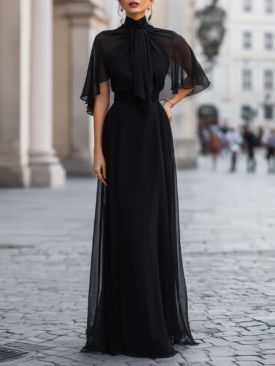 Léon Varel Sheer Tie-Neck Maxi Dress With Flutter Sleeves And Layered Skirt