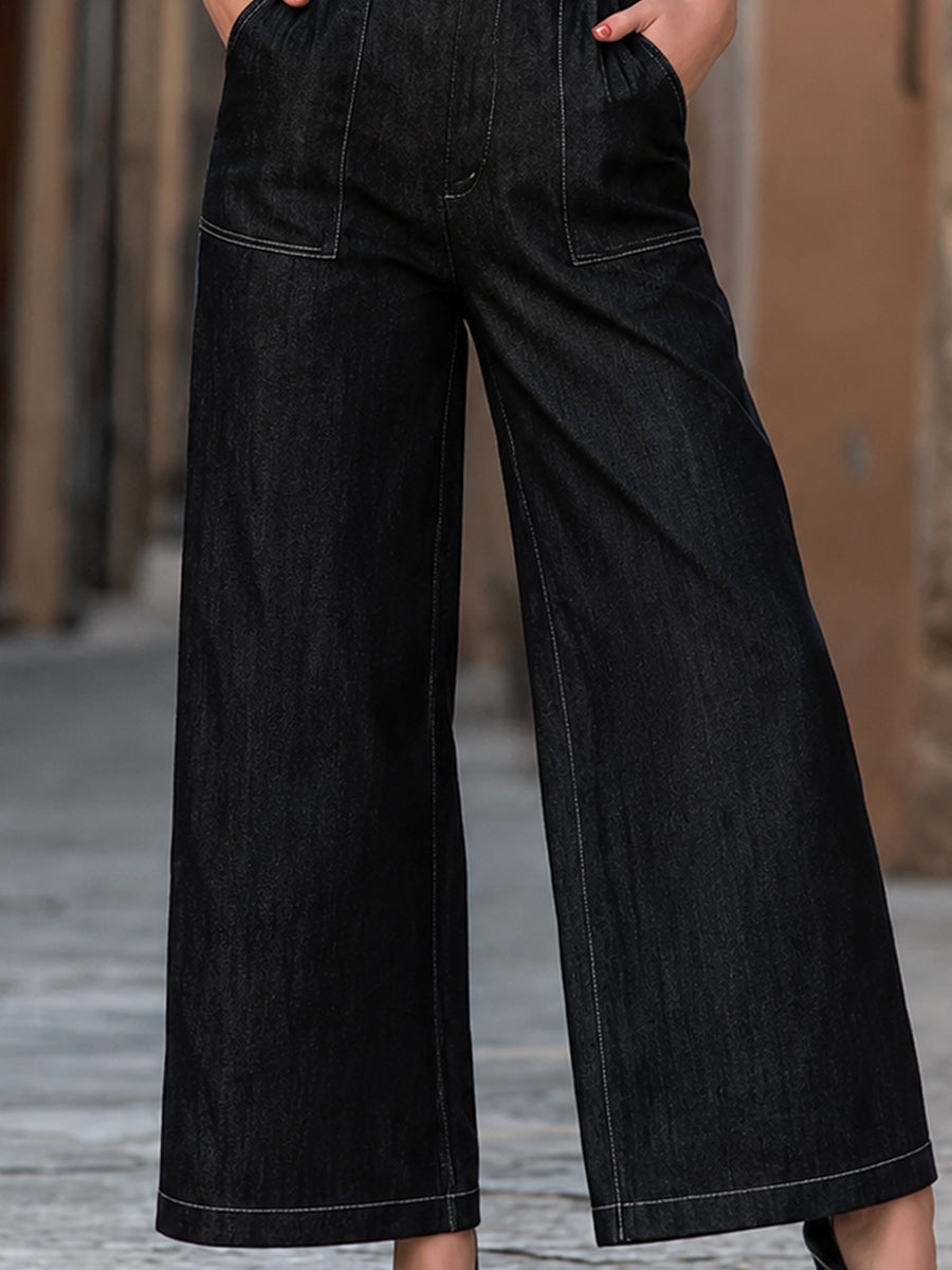 Léon Varel Deep V-Neck Belted Denim Wide-Leg Jumpsuit