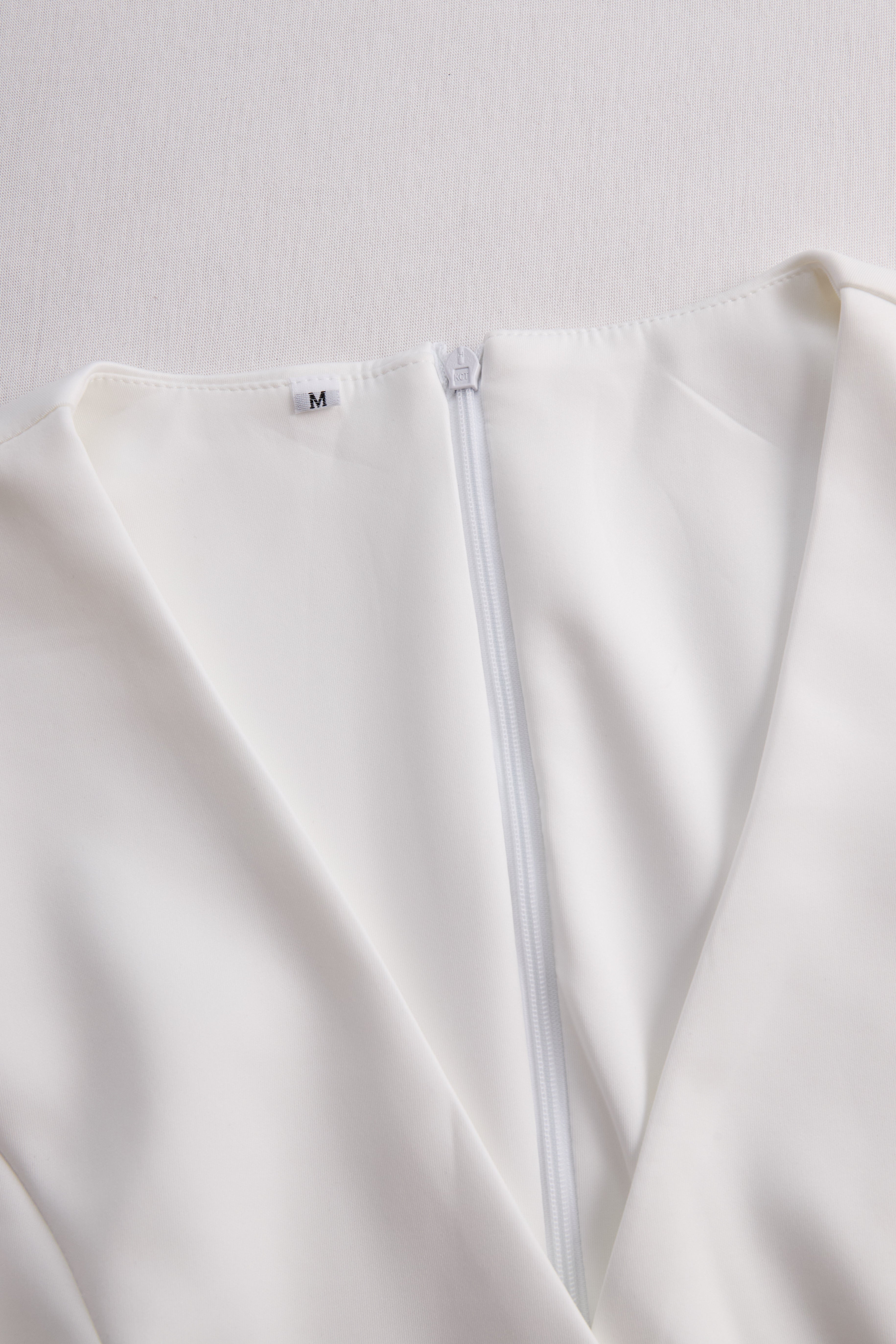 Léon Varel Elegant White Tailored Wrap Dress