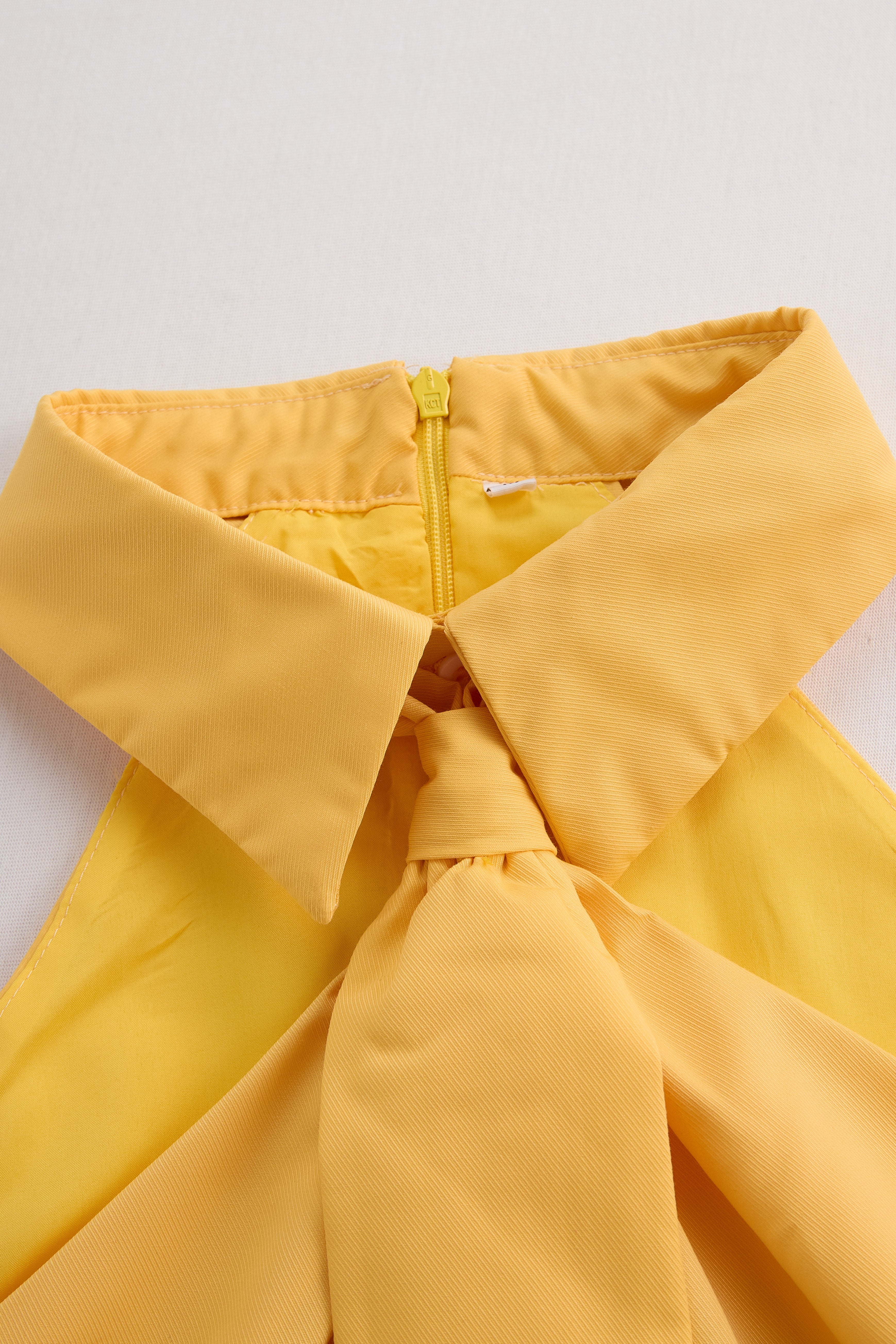 Léon Varel Stylish Sleeveless Halter Blouse with Neck Tie Detail