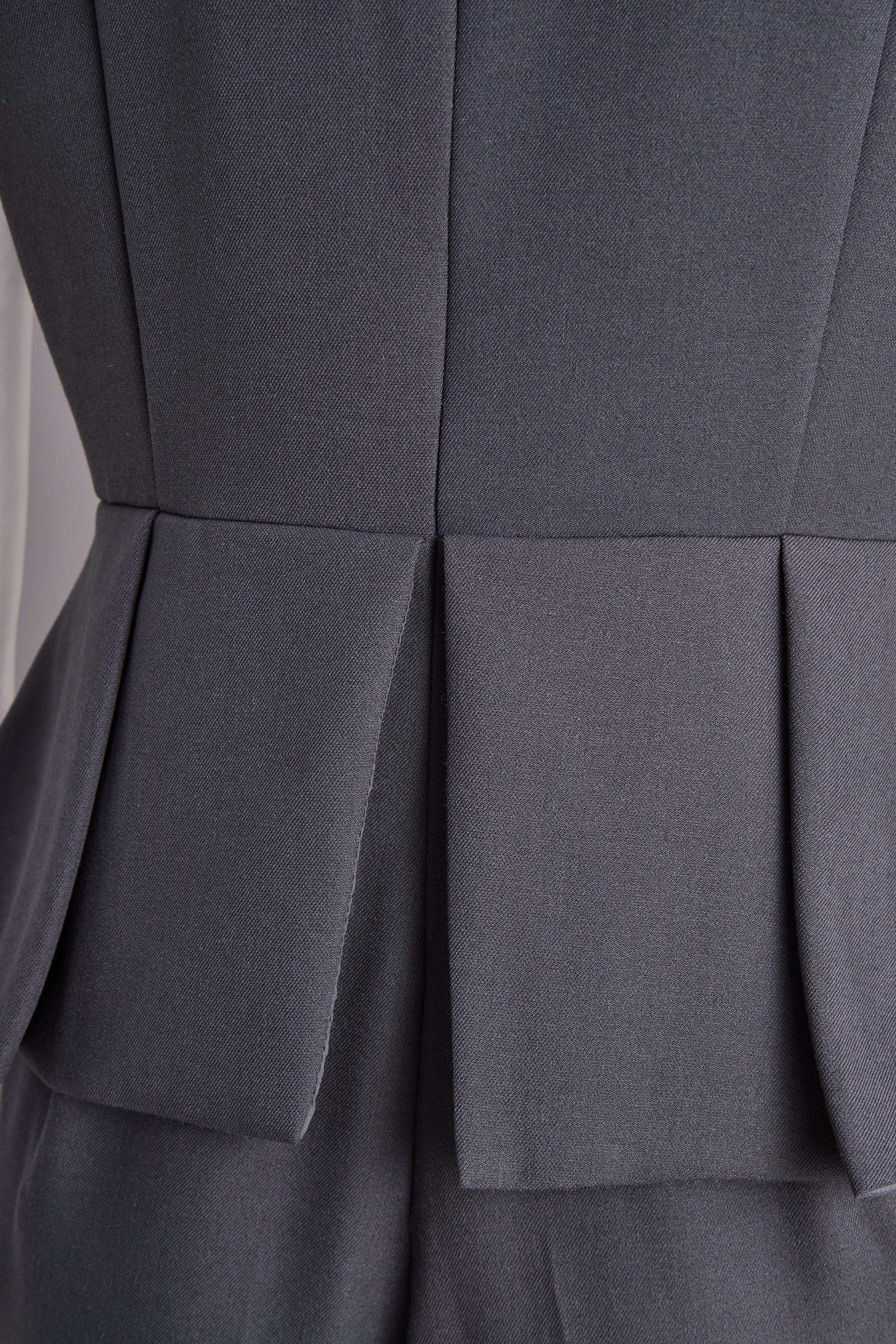 Léon Varel Sophisticated Sleeveless Peplum Jumpsuit In Charcoal Gray