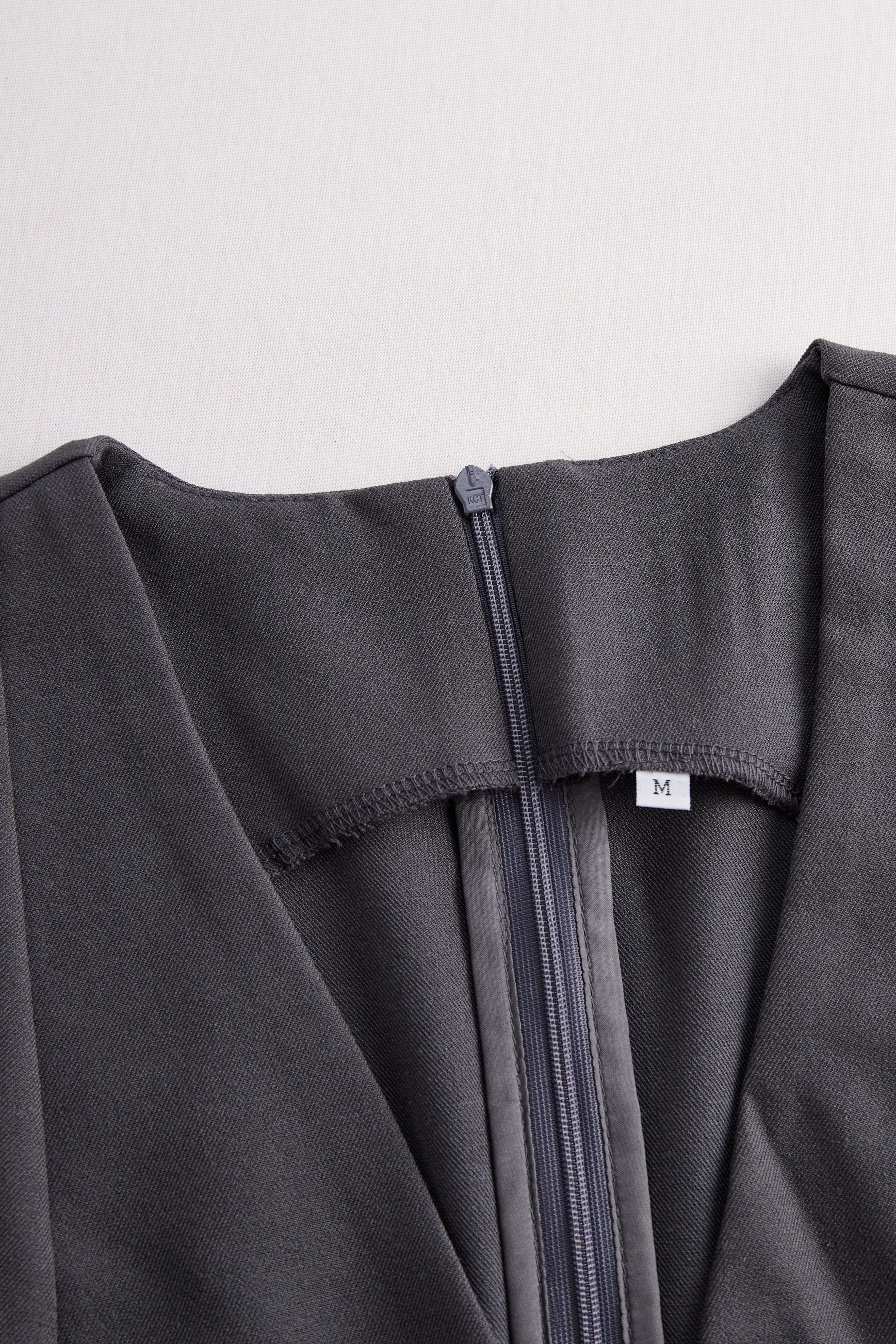 Léon Varel Sophisticated Sleeveless Peplum Jumpsuit In Charcoal Gray
