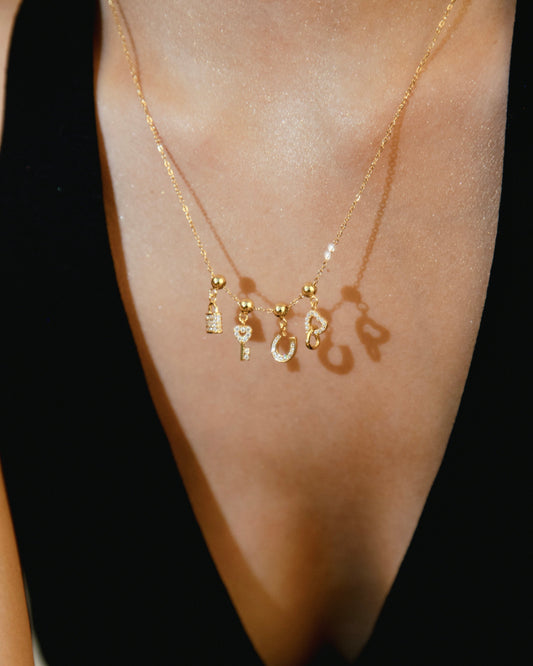 Horseshoe Charm – Gold by Léon Varel